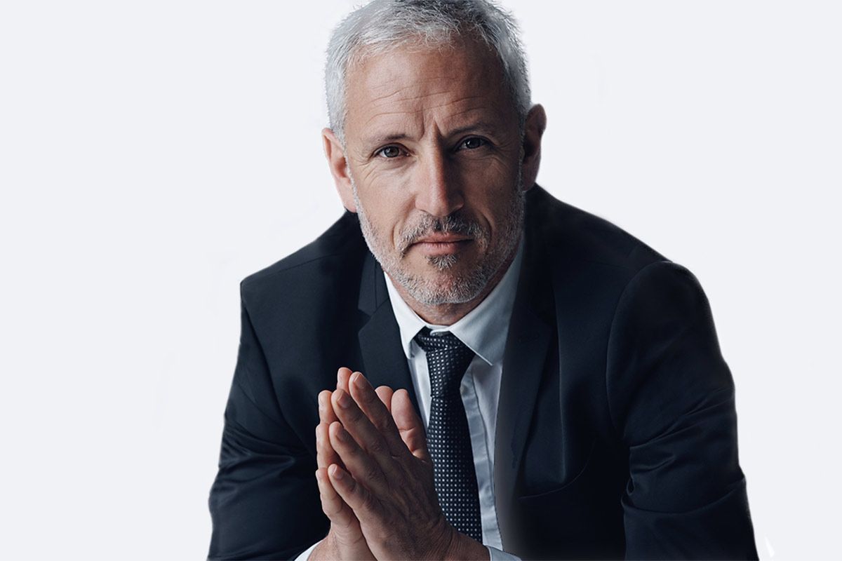 Man In Suit After Hair Restoration Treatment