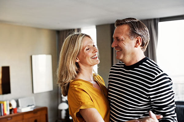 Man Dancing With Woman After Receiving PRP hair restoration in La Jolla