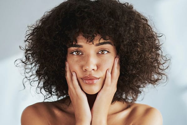 Woman with radiant skin after DiamondGlow in La Jolla.