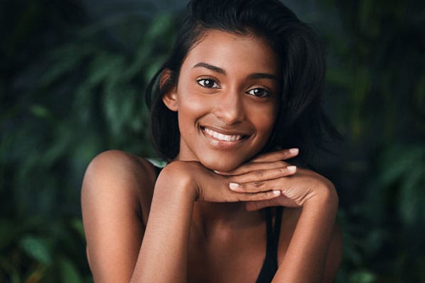 Lady with clear, vibrant skin after DiamondGlow in La Jolla.